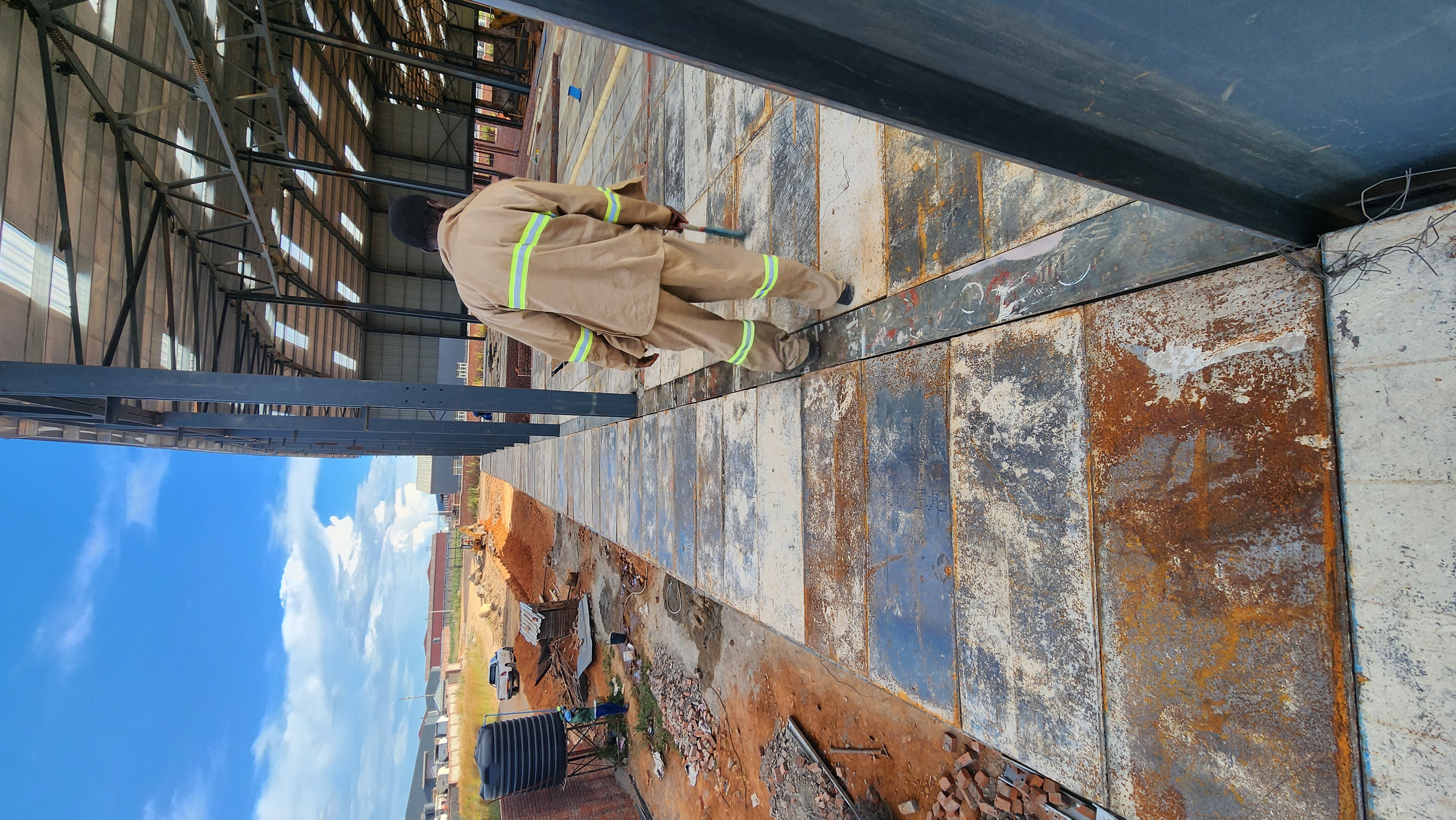Broad construction floor with formwork panels and steel framing