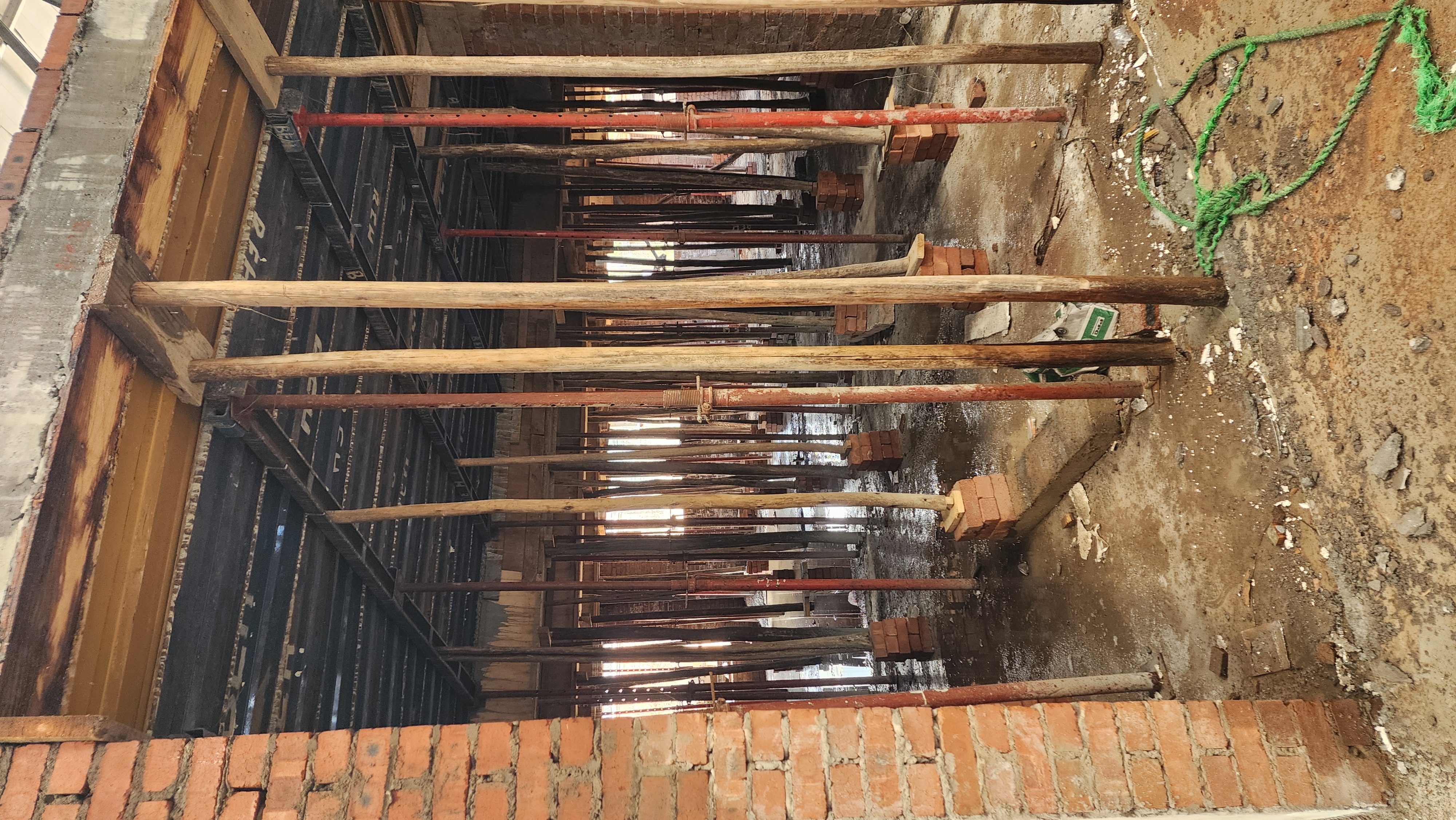 Underside of timber formwork inside a brick structure